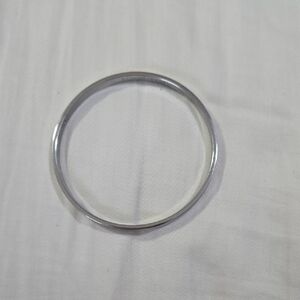 Kate SpadeSimple Silver-Tone Metal Bangle Bracelet "Find The Silver Lining"